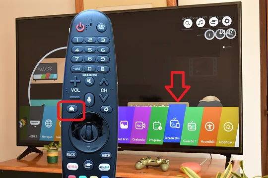 The background picture shows the Screen Share application on the smart TV LG screen and the TV control with the home button highlighted.