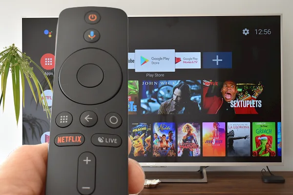 Xiaomi Mi Box S connected to a Sony TV. It is also shown in remote control