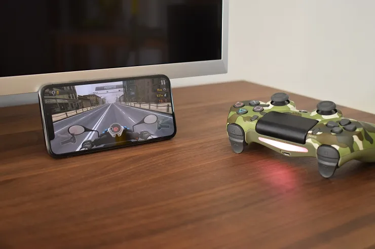 PS4 controller paired with an iPhone X
