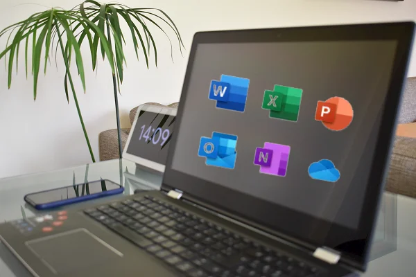 Laptop showing the icons of Word, Excel…